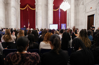 An audience watches as the Fair Play for Women Act becomes official.